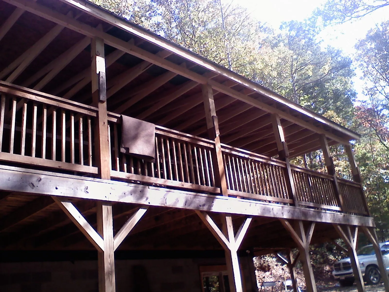 Timber framing under a new elevated porch and deck — Roof Leak Repair in Briggsdale by Roofing Brothers
